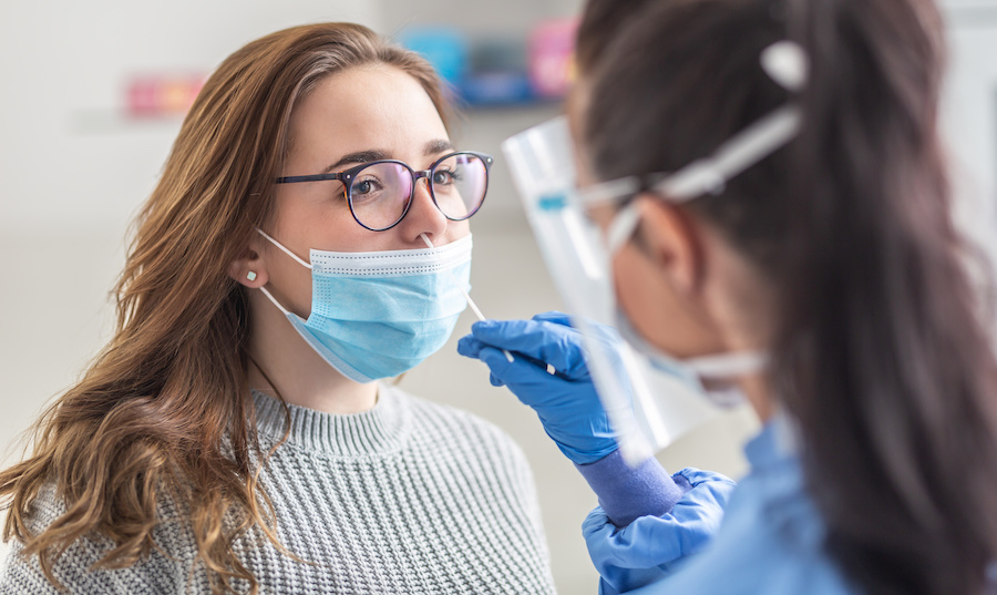 lady receiving a covid test