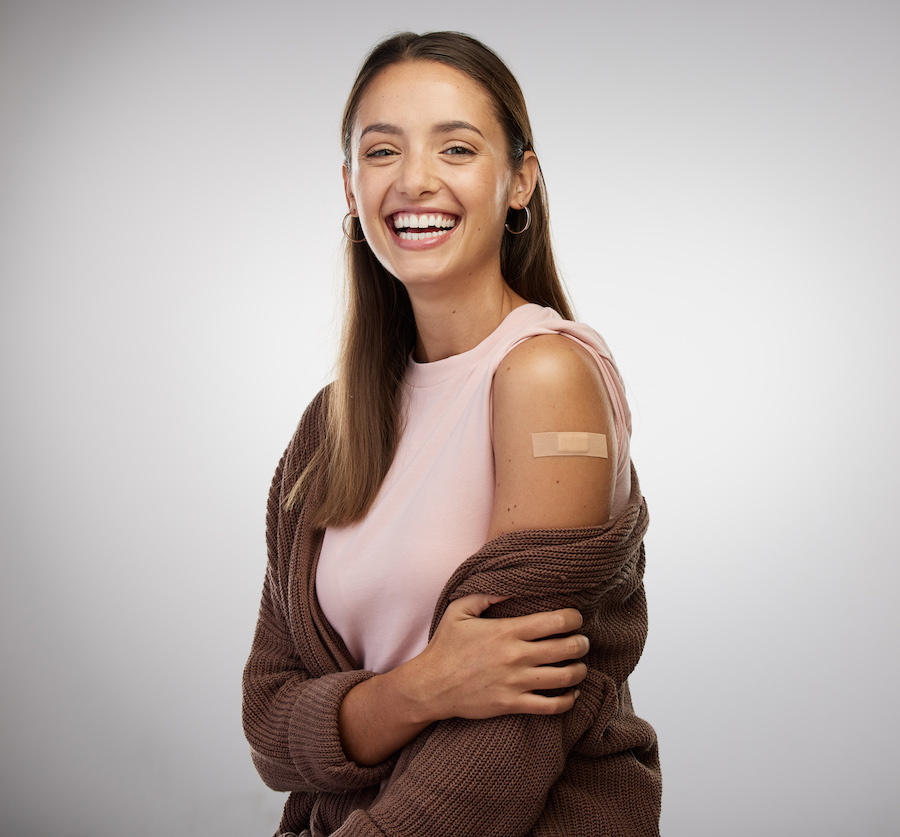 portrait of a smiling lady and her bandaid